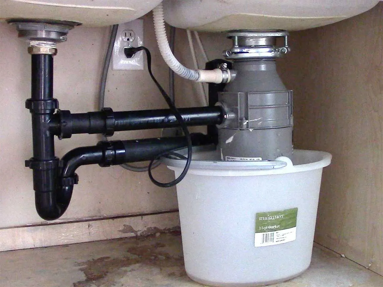 How to Fix a Leaking Garbage Disposal - Healthy Kitchen 101